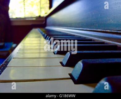 Close up of an upright piano's keys Stock Photo