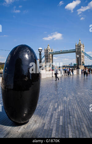 LONDON, UK - MAY 4TH 2016: A view of The Queens Walk promenade alongside Tower Bridge in London, on 4th May 2016. Stock Photo