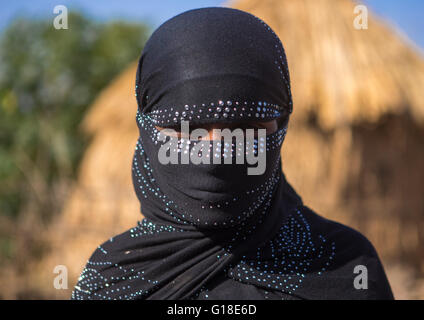 Portrait of an oromo woman with face covered, Amhara region, Artuma, Ethiopia Stock Photo