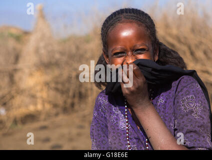 Portrait of an oromo woman laughing, Amhara region, Artuma, Ethiopia Stock Photo