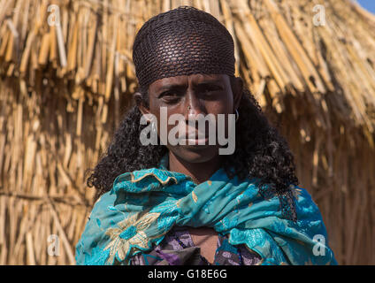 Portrait of an oromo woman with curly hair, Amhara region, Artuma, Ethiopia Stock Photo