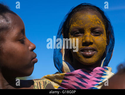 Afar tribe teenage girl with qasil on her face, Afar region, Afambo, Ethiopia Stock Photo