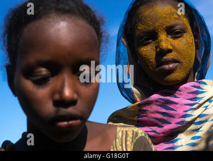 Afar tribe teenage girl with qasil on her face, Afar region, Afambo, Ethiopia Stock Photo