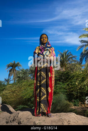 Afar tribe teenage girl with qasil on her face, Afar region, Afambo, Ethiopia Stock Photo