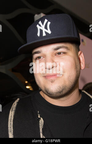 Hollywood, California, USA. 10th May, 2016.  Rob Kardashian attends Blac Chyna's birthday celebration and launch of her new CHYMOJI Collection at the Hard Rock Cafe in Hollywood California, USA. Chyna was engaged to Rob Kardashian last month, and they recently announced that they were expecting a child together.  Credit:  Sheri Determan/Alamy Live News. Stock Photo