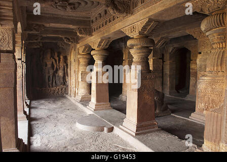 Cave 1 : Carved sculptures of the goddesses Lakshmi and Parvati flanking Harihara, Badami Caves, Karnataka, India. Interior, lef Stock Photo