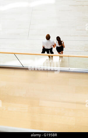 Business couple walking together. Top view Stock Photo