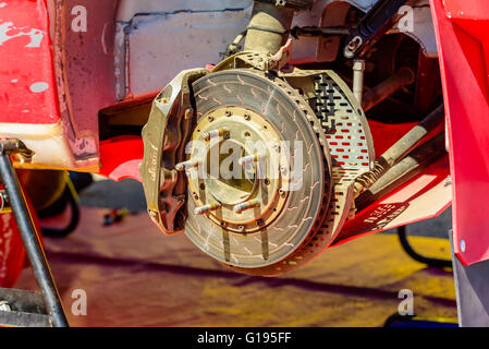 Emmaboda, Sweden - May 7, 2016: 41st South Swedish Rally in service depot. Brake disc and wheelhouse on a Citroen Ds3. Stock Photo