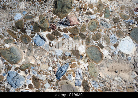 Pebbles bound together in natural cement Stock Photo