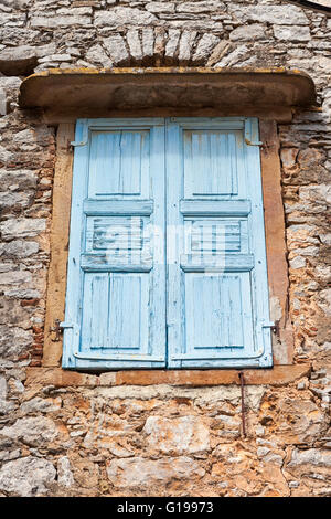 Old window shutters on a building in the village of Mesta, Chios, Greece Stock Photo