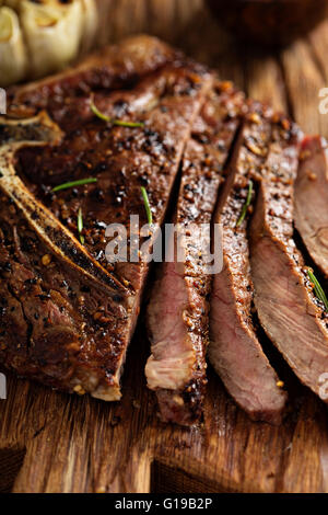 Beef steak cooked on a grill Stock Photo