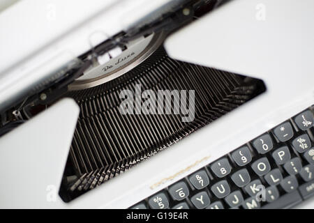Detail view of the keys on a portable metal typewriter, circa 1970, on the diagonal.  Focus is on QWERTY.  May be used to symbol Stock Photo