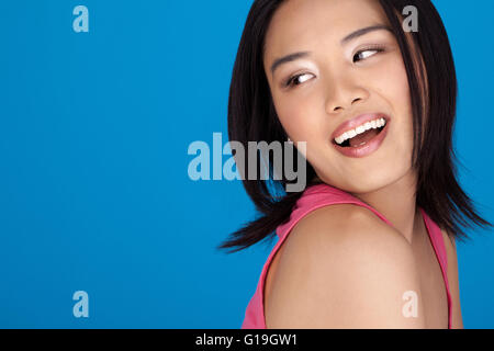 Vivacious laughing Asian woman Stock Photo