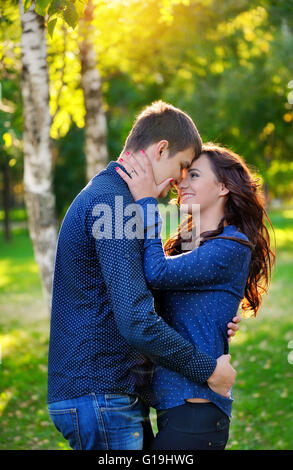 Close up portrait of young happy couple outdoors Stock Photo