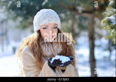 Portrait on beautiful girl in the winter forest Stock Photo