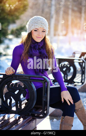 beautiful girl freezing in winter park Stock Photo