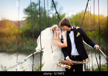 couple in love bride and groom on their wedding day stand on the Stock Photo