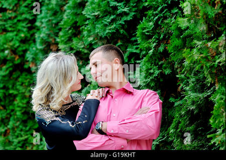 Happy to be together. Low angle view of beautiful young loving c Stock Photo