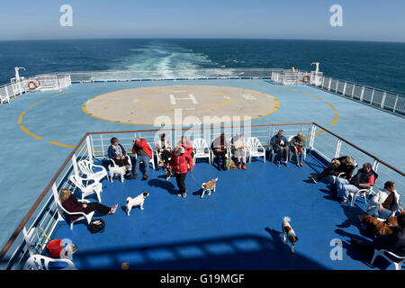 Dog Owners With Pet Dogs Using Exercise Area On Board Brittany Ferry ...