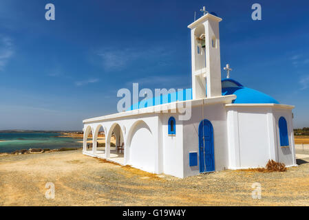 White chapel on a shore in Aiya Napa, Cyprus Stock Photo