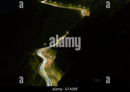 Slide Hilly Light, Photo taken on the on of the cliff of Al Hada Hill Road, Al Hada Thaif, Saudi Arabia, in the night time with Stock Photo
