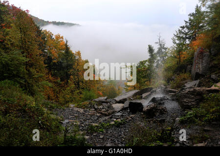 clouds in hills fall colors trees John Boyd Thacher State Park Albany, New York Stock Photo