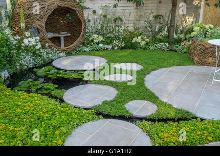 A nature friendly garden based on white.  RHS Hampton Court Show Gardens 2015 - Living Landscapes: City Twitchers Garden, Silver Stock Photo