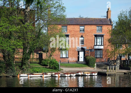 Boats for hire alongside The Ferry House, at Stratford-upon-Avon, Warwickshire, England, UK. Stock Photo