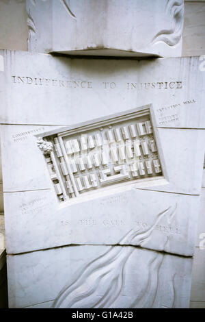 A Holocaust memorial on the Surrogate's Courthouse annex in New York on Holocaust Memorial Day, Yom HaShoah, Thursday, May 5, 2016. The memorial on a pilaster attached to the building is by the artist Harriet Feigenbaum based on a 1945 aerial photograph of the Auschwitz concentration camp. The 1990 memorial is entitled 'Memorial to Victims of the Injustice of the Holocaust'. Over six million Jews and other minorities perished during the Holocaust. (© Richard B. Levine) Stock Photo