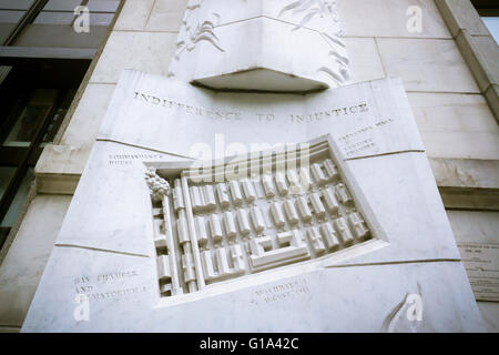 A Holocaust memorial on the Surrogate's Courthouse annex in New York on Holocaust Memorial Day, Yom HaShoah, Thursday, May 5, 2016. The memorial on a pilaster attached to the building is by the artist Harriet Feigenbaum based on a 1945 aerial photograph of the Auschwitz concentration camp. The 1990 memorial is entitled 'Memorial to Victims of the Injustice of the Holocaust'. Over six million Jews and other minorities perished during the Holocaust. (© Richard B. Levine) Stock Photo