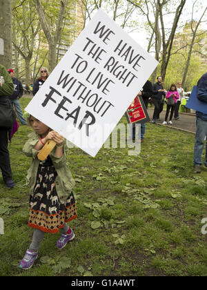 The 4th annual Moms Demand Action Against America’s Second Amendment Rights March in NYC on May 7, 2016. Child expresses fear of gun violence.