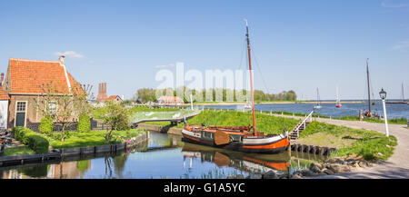 Panorama of a sailing ship at a dike in Enkhuizen, Netherlands Stock Photo