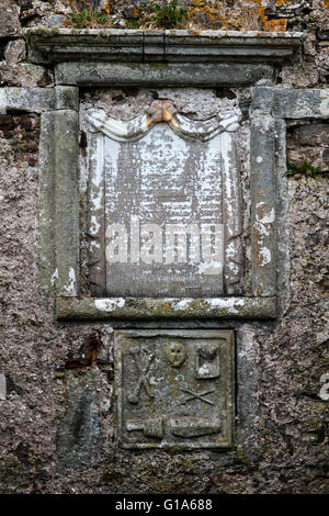 Plaque and tomb in the wall, St Clement's Church, Rodel, Harris, Scotland Stock Photo