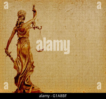 Statue of justice on old paper background, law concept Stock Photo