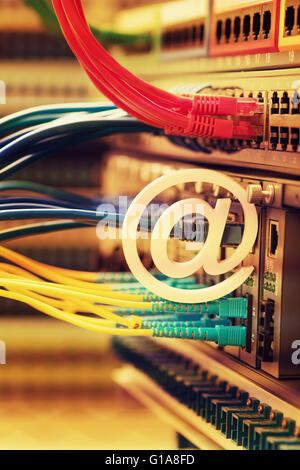 email symbol on Network switch and ethernet cables,Data Center Concept. Stock Photo