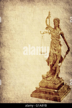 Statue of justice on old paper background, law concept Stock Photo