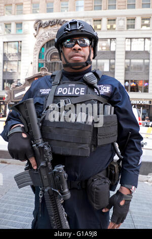 NYPD unit Anti-terrorism  counterterrorism Police officers carrying machine guns in Times Square  Manhattan New York City USA Stock Photo