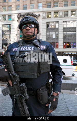 NYPD unit Anti-terrorism  counterterrorism Police officers carrying machine guns in Times Square  Manhattan New York City USA Stock Photo