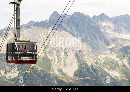 people in cable car/ lift from Chamonix to Aiguille du Midi on the top of Mount Blanc in France Stock Photo
