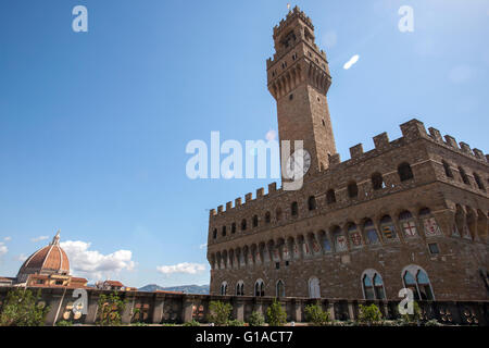 Palazzo Vecchio in Piazza della Signoria, Florence seen from The Uffizi terrace over the Loggia dei Lanzi, Stock Photo