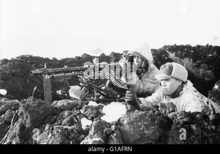 German Paratroopers on the Eastern Front with an MG34 Heavy Machine Gun in the February 1943 Stock Photo