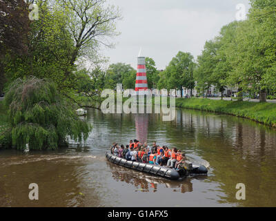 People having a ride in a military inflatable boat, Valkenberg park, Breda, the Netherlands. Stock Photo