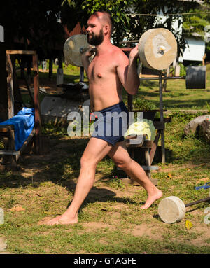 training with barbell outdoors Stock Photo
