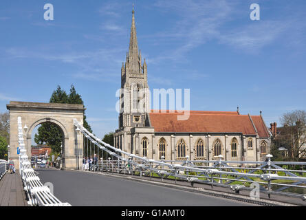 Bucks Marlow - on Marlow suspension bridge over river Thames - view of bridge and All Saints parish church - sunshine + blue sky Stock Photo