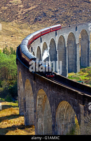 Lochaber, Scotland, UK. Jacobite Steam Train crossing Glenfinnan Viaduct , 2016 season traveling from Fort William to Mallaig Stock Photo