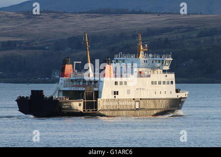 MV Argyle, a car ferry operated by Caledonian MacBrayne (CalMac), passing Cloch Point on the Firth of Clyde. Stock Photo