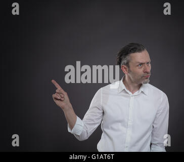 Businessman pointing on something Stock Photo