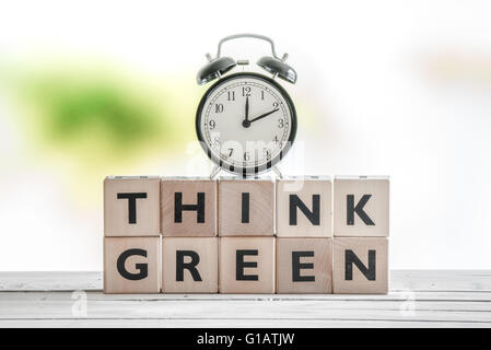 Time to think green sign on a wooden table Stock Photo