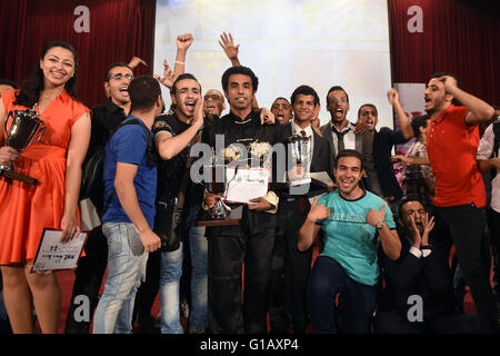 (160512) -- CAIRO, May 12, 2016 (Xinhua) -- Winners celebrate with their supporters after the 'Chinese Bridge' Chinese proficiency competition held in Cairo, Egypt on May 11, 2016. Students from Ain Shams University won both the two top prizes of 'Chinese Bridge' Chinese proficiency competition held in Cairo on Wednesday, securing tickets to the world final in China. (Xinhua/Zhao Dingzhe) Stock Photo