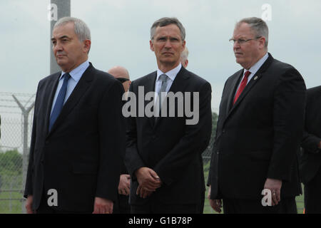 Deveselu, Bucharest. 12th May, 2016. NATO Secretary General Jens Stoltenberg(C), U.S. Deputy Secretary of Defense Robert Work(R) and Romanian Foreign Minister Lazar Comanescu attend the ceremony at Deveselu military base, southwest of Bucharest, Romania on May 12, 2016. The U.S. AEGIS Ashore missile defense system in Romania is certified for operations, NATO Secretary General Jens Stoltenberg announced Thursday. Credit:  Lin Huifen/Xinhua/Alamy Live News Stock Photo